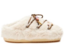 Mules aus Faux Fur mit Perlen