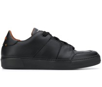 Sneakers mit abgesteppten Einsätzen
