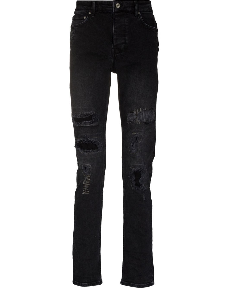 ripped jeans with black patches