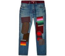Ausgeblichene Jeans im Patchwork-Look