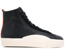 Sneakers mit Kontrastsohle
