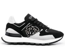 Sneakers mit Wildledereinsätzen