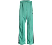 Sporthose mit aufgesticktem Schmetterling