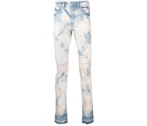 Ausgeblichene Jeans mit Farbklecksen