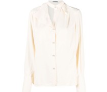 Bluse mit asymmetrischem Kragen