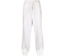 logo-patch distressed track pants