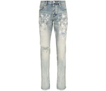 Skinny-Jeans mit Farbklecks-Print