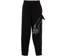 Tapered-Hose mit gezeichneter Hand