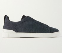 Slip-ons aus Canvas mit Lederbesätzen