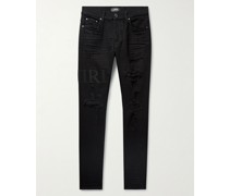 Skinny Jeans in Distressed-Optik mit Logoapplikation
