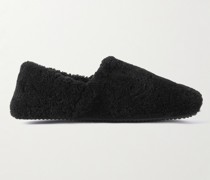 Slippers aus Shearling mit Lederbesatz