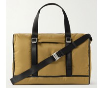 Wattierte Reisetasche aus recyceltem Nylon mit Lederbesätzen