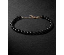 Armband mit Onyxen und Details aus Gold