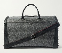 Sneakender Weekender aus strukturiertem Leder mit Nieten und Gummibesätzen