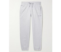 + Pharrell Williams Tapered Embroidered Cotton-Jersey Sweatpants