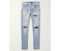 MX1 Skinny Jeans mit Einsätzen aus Leder in Distressed-Optik