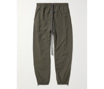 Schmal zulaufende Hose aus wattiertem Shell mit Logoapplikation und Kordelzugbund