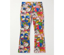 Schmal geschnittene ausgestellte Jeans mit Print und Fransen