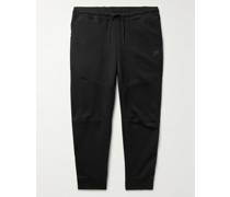 Sportswear schmal zulaufende Jogginghose aus technischem Fleece aus einer Baumwollmischung mit Logoprint