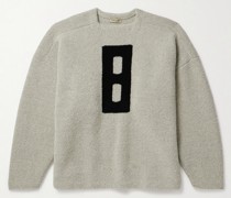 Oversized-Pullover aus Bouclé aus einer Schurwollmischung mit Intarsienmotiv