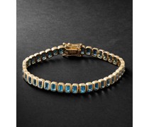Tennisarmband aus 14 Karat Gold mit blauen Topasen
