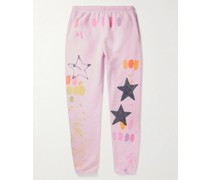 Schmal geschnittene und schmaler zulaufende Jogginghose aus Baumwoll-Jersey mit Strass und Print