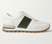 Sneakers aus vollnarbigem Leder mit Besatz