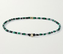 Armband mit Glasperlen, Diamanten und Details aus Gold