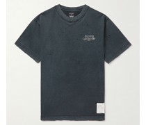 T-Shirt aus MothTech Baumwoll-Jersey mit Logoprint in Distressed-Optik