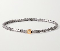 Armband mit Zierperlen aus Hämatit und Detail aus Gold mit Diamanten