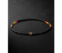Armband mit Zierperlen, Emaille und Details aus Gold