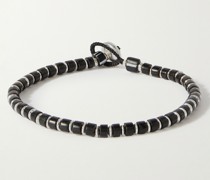 Armband aus Kordel mit Zierperlen aus Gagat und Details in Silber