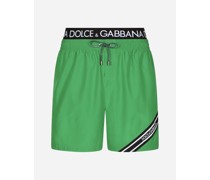 Mid-length swim trunks with branded band