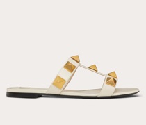 Valentino Garavani FLACHE SLIDE-SANDALEN „ROMAN STUD“ aus KALBSLEDER Frau