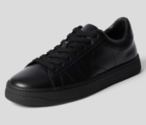 Sneaker mit Brand-Detail