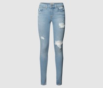 Super Skinny Fit Jeans mit Destroyed-Details Modell '710'