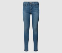 Skinny Fit Jeans mit ausgefransten Abschlüssen Modell '710'