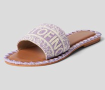 Pantoletten mit Statement-Print