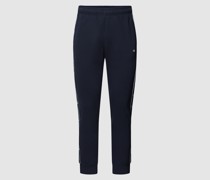 Sweatpants mit Label-Applikation