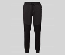 Slim Fit Sweatpants mit Reißverschlusstaschen Modell 'PUMATECH'