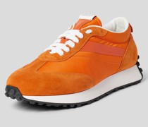 Sneaker mit Kontrastbesatz