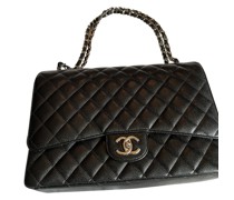 Second Hand Flap Bag aus Leder in Schwarz