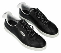 Second Hand Sneakers aus Leder in Schwarz