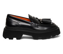 Schwarze Loafer für Damen aus Leder mit Quasten