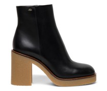 Women’s black leather high-heel ankle boot