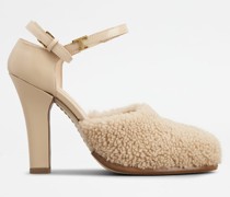 D'Orsay-Pumps aus Lammfell und Leder
