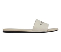 Flache Mules mit Logo