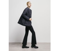 Wendbare Schwarze Kunstpelzjacke