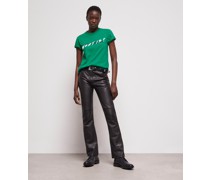 Grünes T-shirt mit „what Is“-schriftzug
