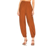 SILVIA TCHERASSI HOSE CHILEAN in Rust